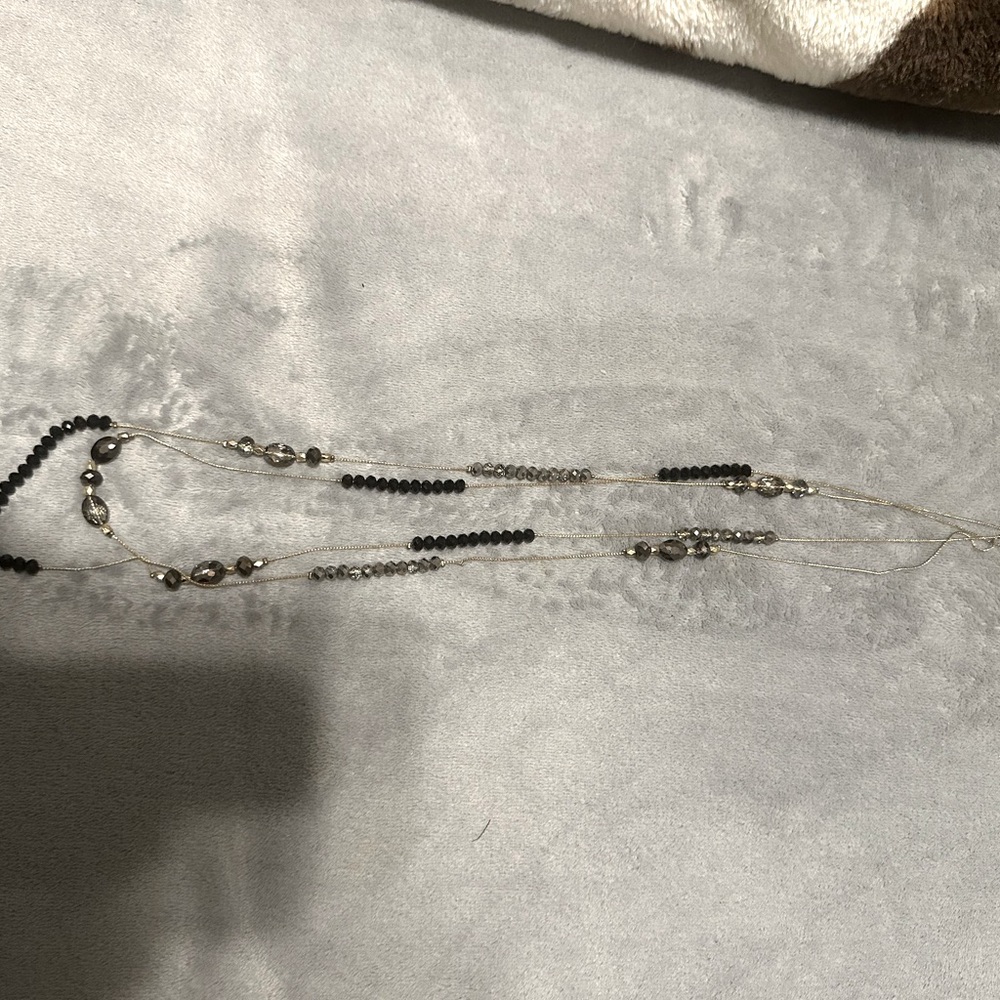 Double layer long necklace.